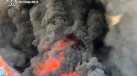 In this photo provided by the Ukrainian Emergency Service, firefighters put out a fire in a warehouse following a Russian drone attack near Kyiv, Ukraine on Saturday.