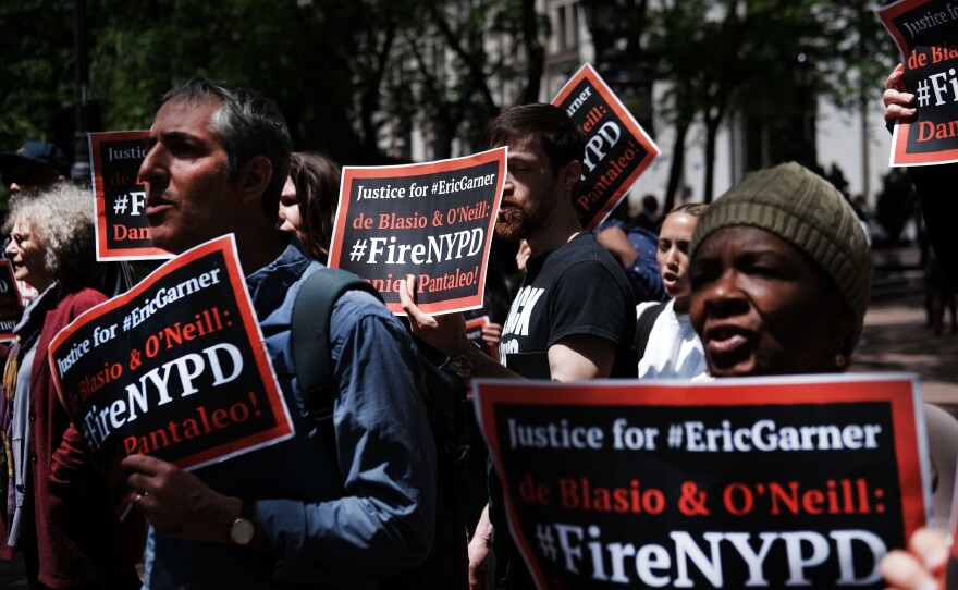Protesters gathered outside of Police Headquarters in Manhattan in May to protest during the police disciplinary hearing for Officer Daniel Pantaleo, who was accused of using a chokehold that led to Eric Garner's death in 2014.