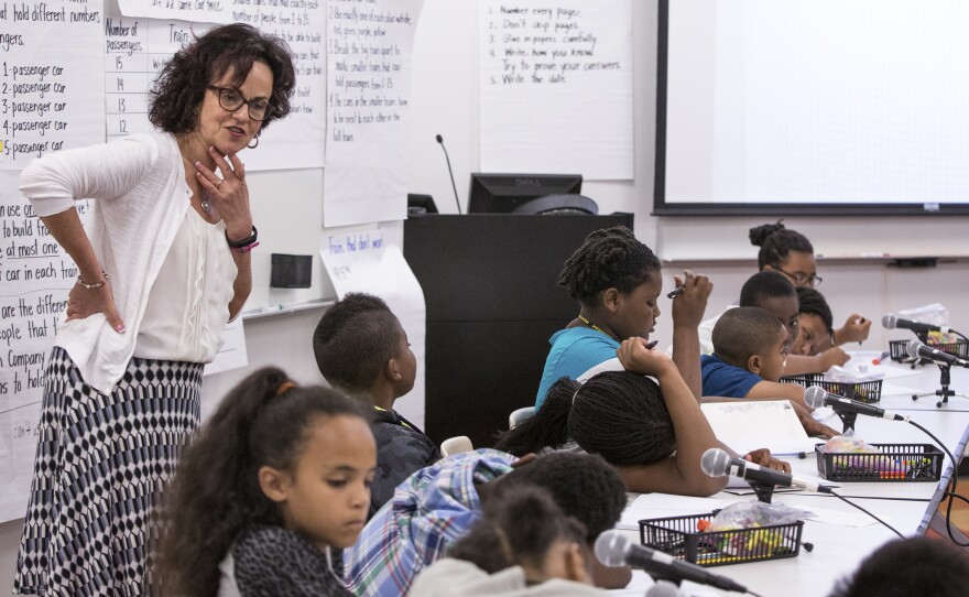 Deborah Ball introduces a math problem to students at the Mathematics Teaching and Learning to Teach seminar at the University of Michigan.