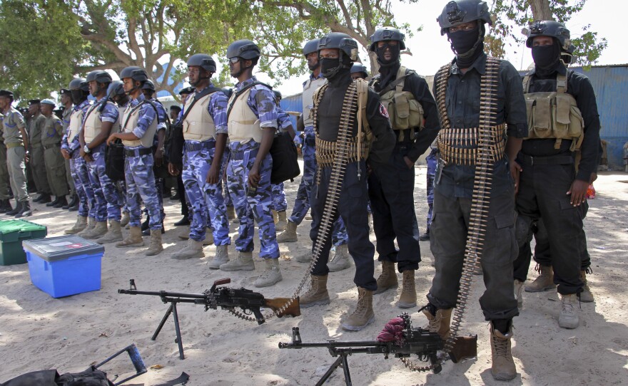 Somali soldiers prepare to secure the Somali capital of Mogadishu on Tuesday, on the eve of presidential elections.