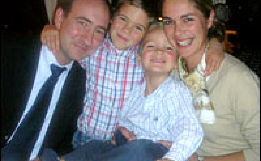 French-speaking Marc Henri de Bruyne and his wife, Flemish-speaking Marie Elise Adriansens, and their two sons Antoine and Louis. The couple is raising their children in both languages and cultures.