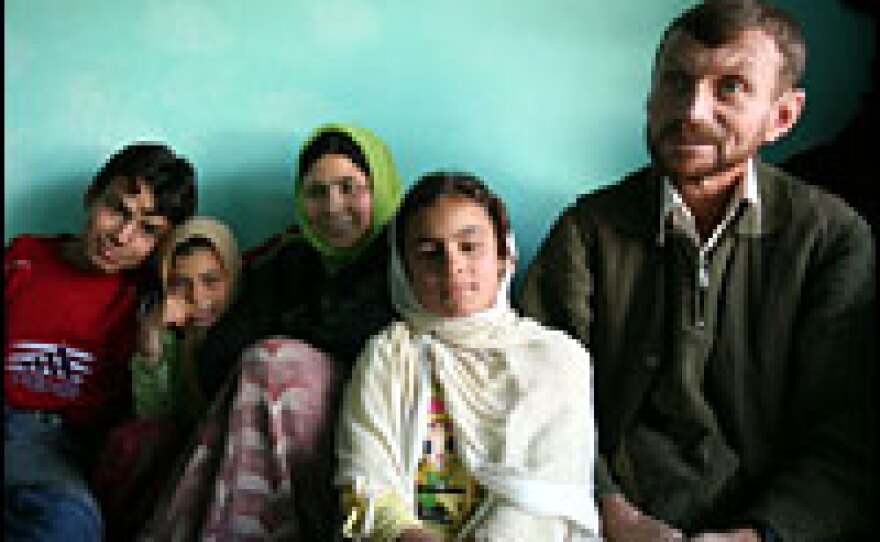 Gennady Tseuma, his wife Bibi Awaa and three children are gathered at his home in Kunduz. Bibi Awaa and the children say they want to move to Ukraine, but they are reluctant to let their father go without them. They say they are afraid he might not come back.
