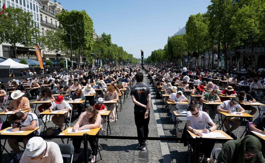 Organizers said the Paris event may have been the world's largest-ever dictation.