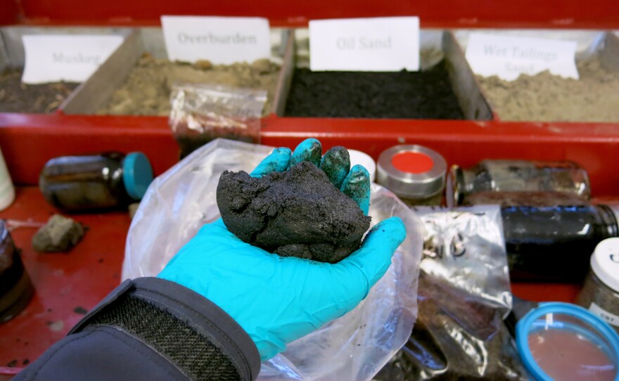 An up-close look at oil sands. Oil sands come out of the ground with the consistency of sandy Play-Doh. Only about 10-13 percent of the gunky ball is actual bitumen that will be turned into oil. Upgrading it to oil requires heat and additional processing, which is why crude from oil sands creates more of the pollution that causes climate change than traditional drilling.