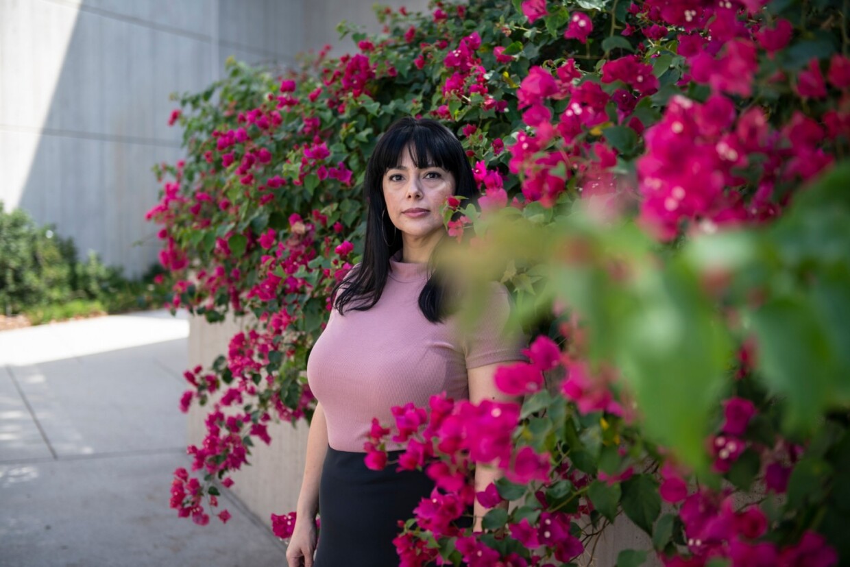 Mayra Romo stands for a portrait at Cal State Dominguez Hills on Sept. 15, 2022, where she works as a counselor for victims of domestic violence and sexual assault. “I want people to know that they are not alone, unfortunately, we (counselors) exist because a lot of people have these experiences,” Romo said. “But right now the department is underfunded and there is not enough support for victims.”