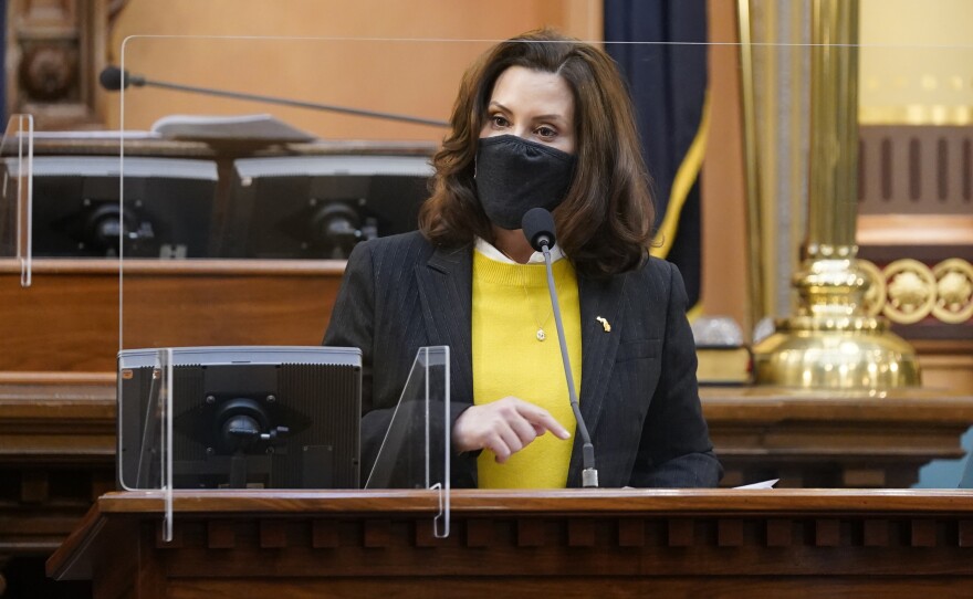 Michigan Gov. Gretchen Whitmer addresses the state's Electoral College at the state Capitol, Monday, Dec. 14, 2020, in Lansing, Mich. The building was closed to the public due to security threats around the vote.