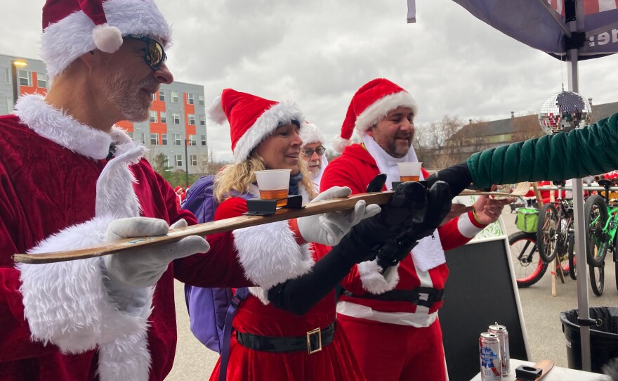 Mark Hense (left), Jen Hense (middle), and Zach Kester (right) kick things off with a shotski.