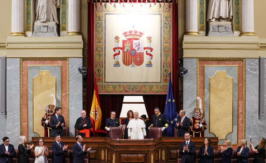 Pope Leo XIV is flanked by Francina Armengol, President of the Congress of Deputies of Spain, as he arrives to meet with members of the Spanish Parliament at the Congress of Deputies, in Madrid, Monday, June 8, 2026.