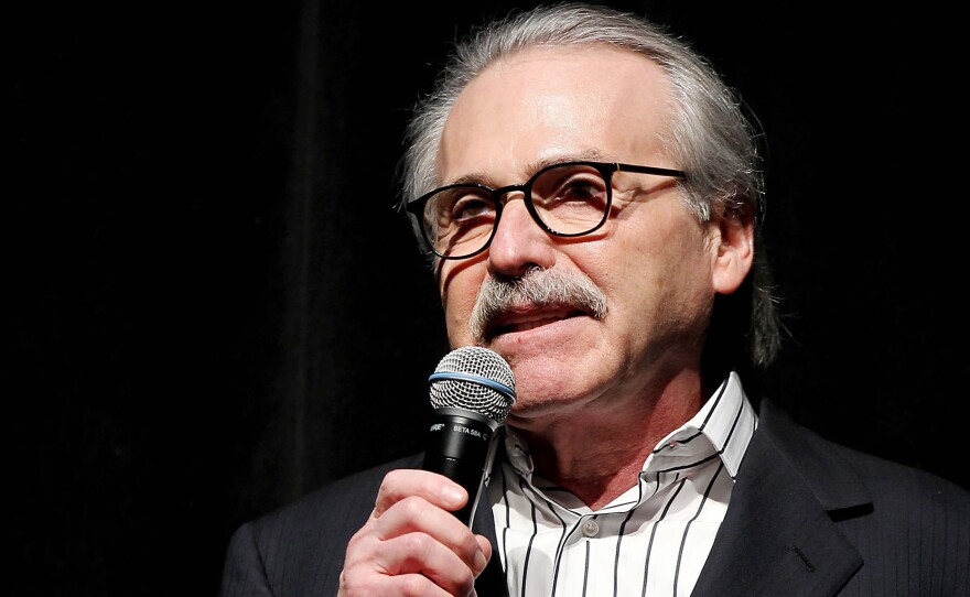 David Pecker, chairman and CEO of American Media, addresses a party in 2014. Reports say he has been granted immunity in the Michael Cohen case.