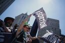 Abortion-rights activists carry flags as they gather to participate in the Queer Liberation march in New York City earlier this week.