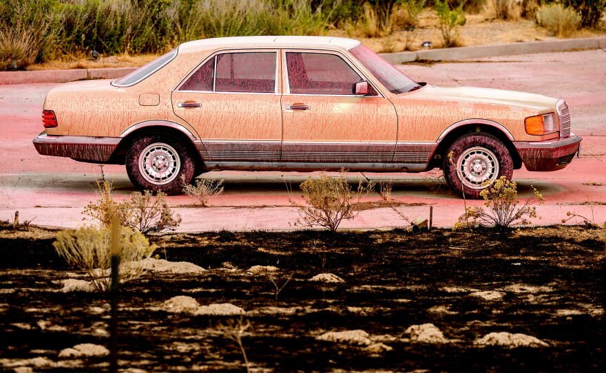 Fire retardant coats a vehicle following the Bug Fire near Reno, Nev., Thursday, Aug. 13, 2026.