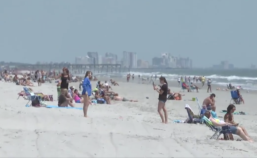 People descended upon Garden City's beach in South Carolina Tuesday, within minutes of an executive order taking effect that allows beaches to reopen if local leaders allow it. Other nearby beaches remain closed.