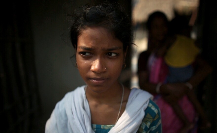 Ria Sardar, 17, can easily study after dark now, thanks to solar power in her village.