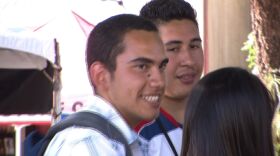 Christian Castro talks with friends outside the San Diego State Bookstore, August 29, 2011.