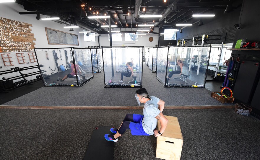 A workout class at Inspire South Bay Fitness in Redondo Beach, Calif., restricted students to plastic pods in June.