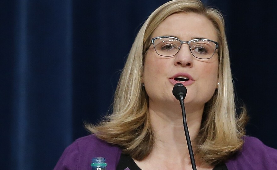On Saturday, Phoenix Mayor Kate Gallego, pictured above in September 2018, apologized to the city following an outcry over footage showing police officers pointing a gun and yelling at a family as part of an investigation into a claim that a doll was shoplifted from a Family Dollar store in Phoenix.