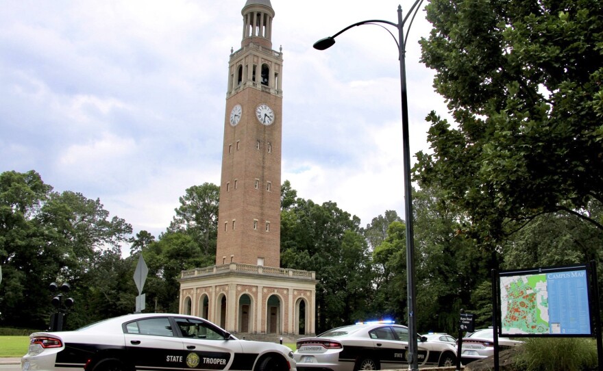Law enforcement respond to the University of North Carolina at Chapel Hill campus on Monday after the university locked down and warned of an armed person on campus.