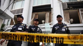 Police stand guard over the bombed hotel frontage following this morning's bomb blast at the Ritz-Carlton hotel on July 17, 2009 in Jakarta, Indonesia. Jakarta was rocked by 2 apparent bombs at the Ritz Carlton and also the Marriott hotel. 