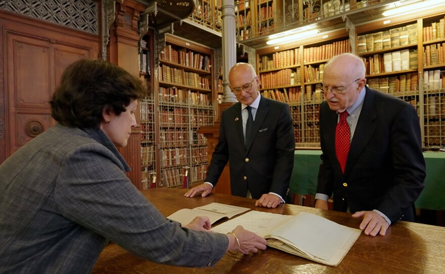Francois-Henri Briard and Judge Douglas Ginsburg view the original Declaration of the Rights of Man drafted by the Marquis de La Fayette and Thomas Jefferson in "We Hold These Truths."