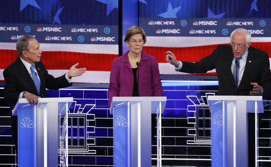 Former New York City Mayor Michael Bloomberg (left), Sen. Elizabeth Warren and Sen. Bernie Sanders participate in last week's Democratic presidential primary debate in Las Vegas.