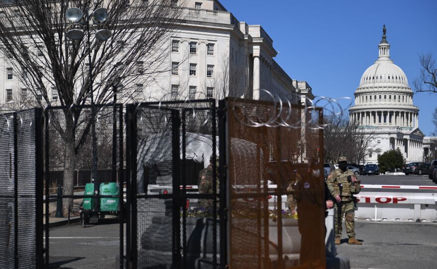 Members of the National Guard patrol near the U.S. Capitol Building in Washington in March.