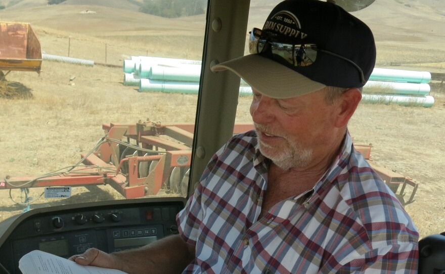 Dave Alford tries to unravel software codes to find out what's wrong with his tractor.