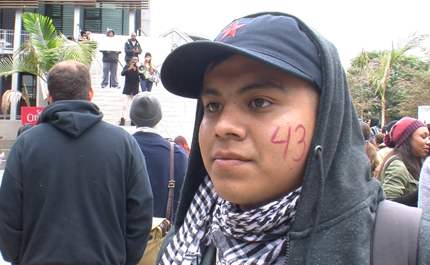 Luis Lopez wears a "43" on his cheek to commemorate a group of 43 students who went missing in Mexico. Lopez and his classmates walked out of classes on Dec. 2, 2014, to protest the social disenfranchisement of minorities in the U.S. and Mexico.