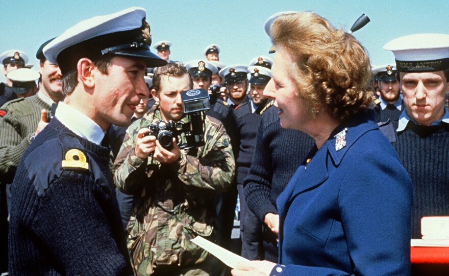 British Prime Minister Margaret Thatcher meets personnel aboard the HMS Antrim 08 January 1983 during her five-day visit to the Falkand Islands.