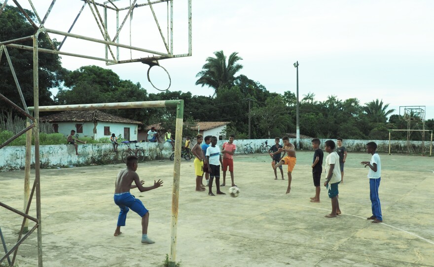 Young residents of Central play a pickup soccer game.