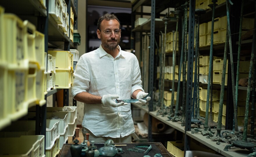 Alessandro Russo in Pompeii storage facility.