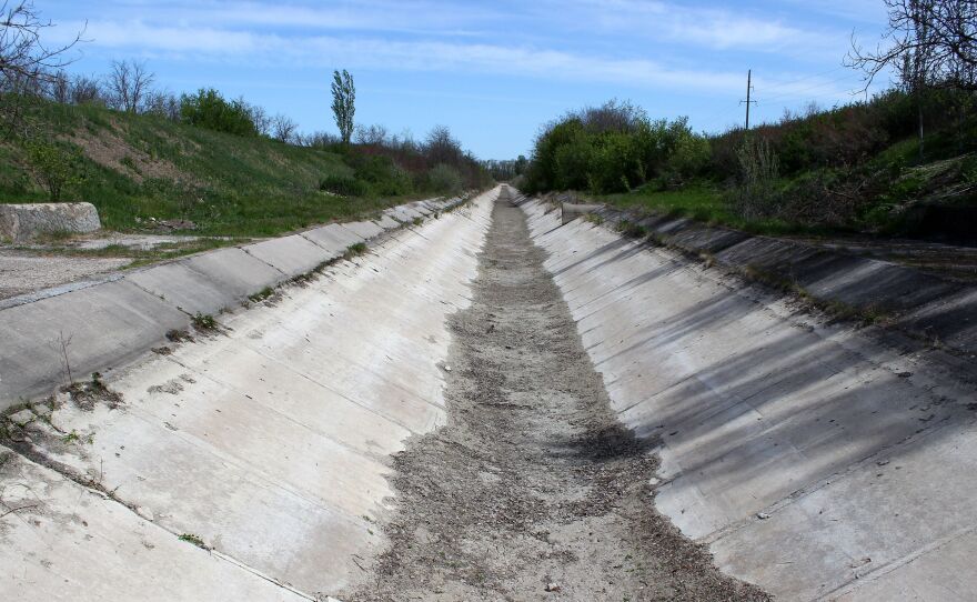 A picture taken in Crimea's Kirovsky region on April 27, 2014, shows an empty Northern Crimean Canal. Ukrainian officials closed the canal, which supplies most of the peninsula's water, after Russia annexed Crimea. This year, Russia blew up the dam blocking the canal.