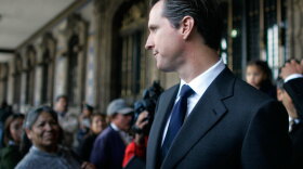 San Francisco Mayor Gavin Newsom walks at the main Zocalo square in Mexico City after a meeting in August with that city's mayor, Marcelo Ebrard. Newsom is battling with San Francisco's local government on the city's sanctuary status for young undocumented immigrants.