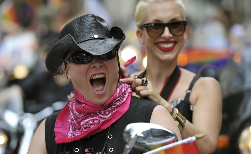 Mayor Michael Bloomberg joined hundreds of bikers whose motorcycles roared to life at noon to kick off the celebration, a colorful cavalcade of activists and others who marched down Fifth Avenue.