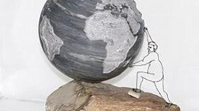 A photo of a marble sculpture by Lileane Peebles titled Tipping Point, 2016.