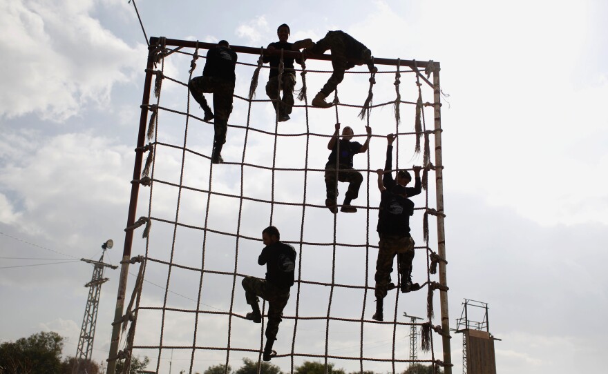 Palestinians take part in training organized by Hamas in the southern Gaza Strip town of Rafah on Jan. 11, 2014.