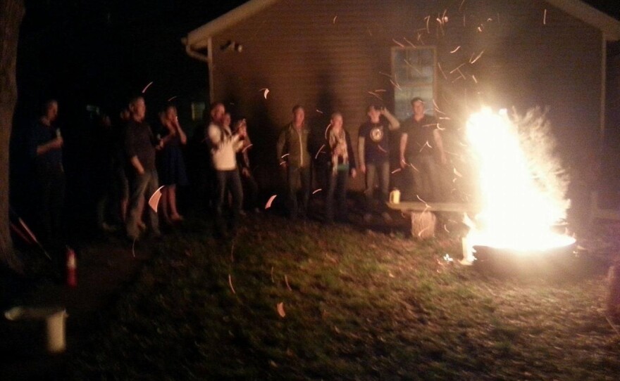 Karla Burk hosts an "F-You Winter" themed party where everyone gathers to light old Christmas trees on fire.