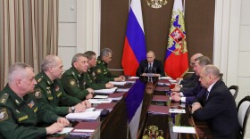 Russian President Vladimir Putin chairs a meeting of top executives of the Defense Ministry and military-industrial complex in the Black Sea resort of Sochi, Russia, Friday, May 19, 2017.