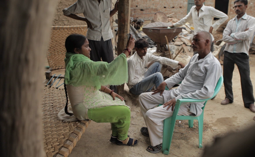 Chief Reporter Meera interviewing the family of a mine worker who was killed in an accident.