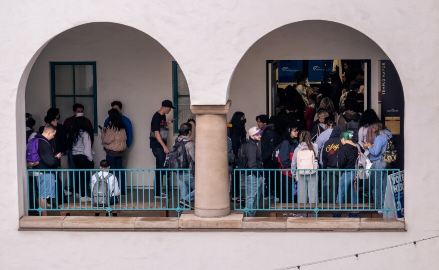 Students crowd into the on campus polling place at San Diego State University on Nov. 8, 2022.