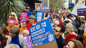 Demonstrators rally calling for more state funding towards those with intellectual and developmental disabilities in downtown San Diego, April 5, 2019. 