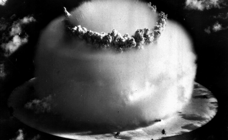 So-called atomic veterans who worked on nuclear weapons tests, like this one from July 25, 1946 file photo above Bikini atoll in the Marshall Islands, are fighting to renew funds that compensate them for health effects from their work.