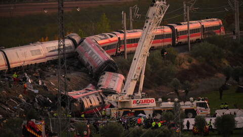 Emergency services work at the scene of a collision between two trains in Urda, Spain, on Wednesday, Oct. 28, 2026.