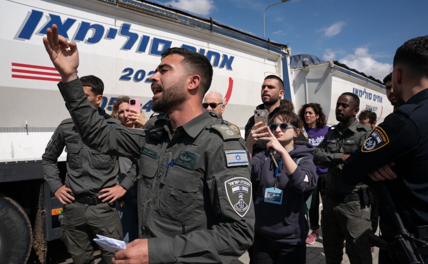 Activists from Standing Together, which describes itself as a grassroots Jewish and Arab group seeking peace, set out in a convoy, including a large truck holding donated dried goods and cans, with the goal of delivering aid directly to Gaza on March 7. The group was blocked en route to the Kerem Shalom crossing by Israeli police and soldiers.
