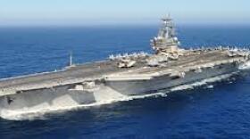 The aircraft carrier USS Ronald Reagan at sea. 