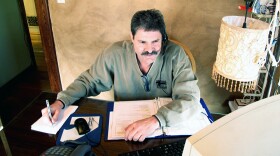 Randy Howland works from home for a major telecom company making $10 an hour. To help bring in more money, his wife, Lisa, had to find a second job.