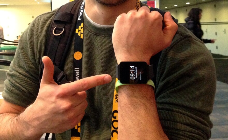 Eitan Marder-Eppstein shows off his LG smart watch at a March 2014 convention for Game Developers in San Francisco.