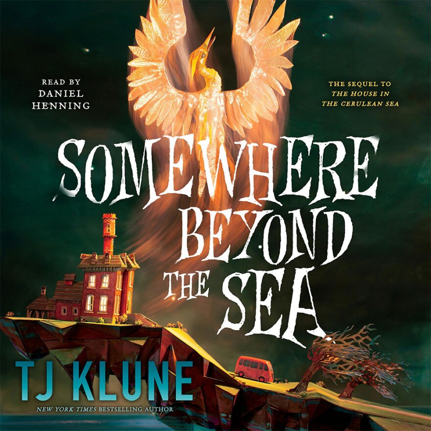 The audiobook cover for "Somewhere Beyond the Sea" by TJ Klune, read by Daniel Henning, is shown.