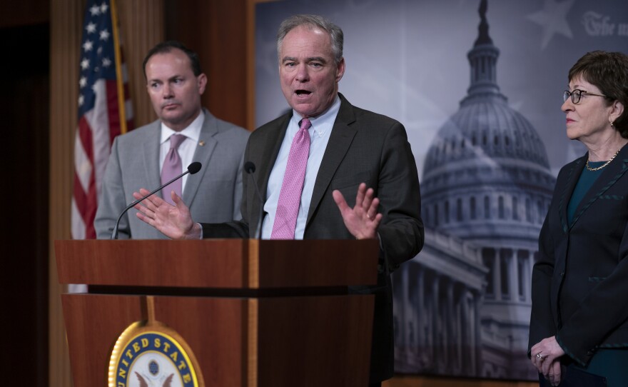 Sen. Tim Kaine, D-Va., (center), Sen. Mike Lee, R-Utah, and Sen. Susan Collins, R-Maine, have been pushing a bipartisan resolution to limit the president's war powers regarding Iran.
