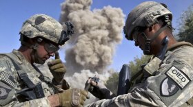 Soldiers from Chaos Company, 101st Airborne Division, destroy a building in Kandahar. Troops from Headquarters Company recently entered the abandoned Kandahar village of Haji Abdu Rauf to destroy anything useful so the Taliban don't use it as a safe haven.