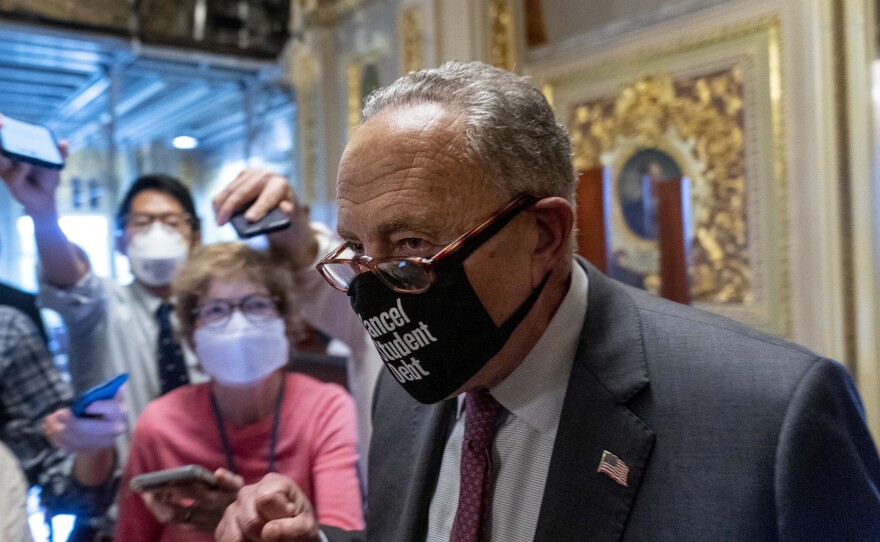 Senate Majority Leader Sen. Chuck Schumer of N.Y., reaches a deal with Republicans for a short-term increase of the debt ceiling. (AP Photo/Andrew Harnik)